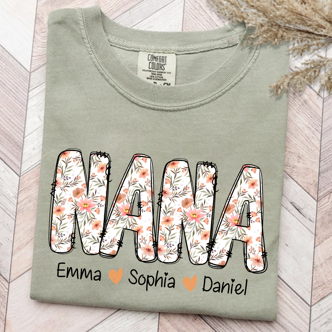 Comfort Colors_C2_AE Nana Flower 2025 Shirt Custom Grandma And Grandkids Shirt_Sandstone_S 1 uXsFT