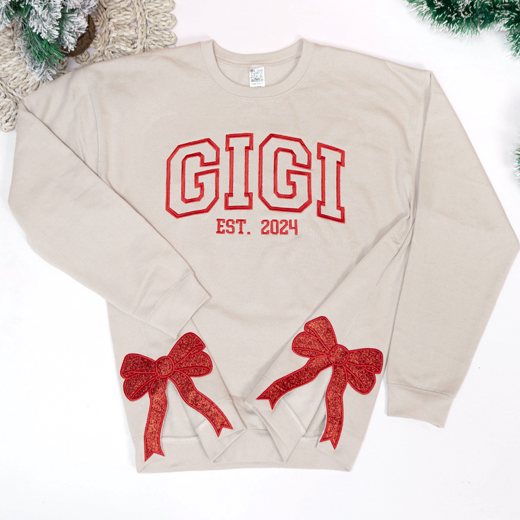 Custom Name Gigi Est With Kids Name - Personalized Embroidered Christmas Bow Embellished Sweatshirt Custom Side Bow Cut-Out Sweatshirt - NH96