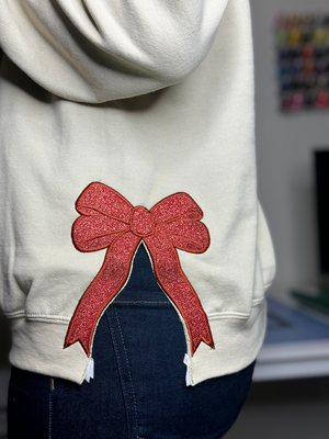 Blessed Gigi Glitter Embroidered Mimi, Grandma Christmas Bow - Personalized Side Bow Cut-Out Sweatshirt Embellished - Gift For Grandma, Mom - NH96