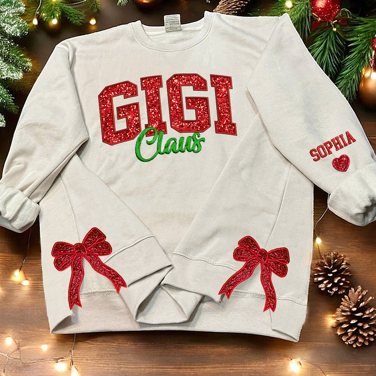 Custom Name Gigi Claus Embroidered Mimi, Grandma Christmas Bow Embellished Personalized Side Bow Cut-Out Sweatshirt - NH96