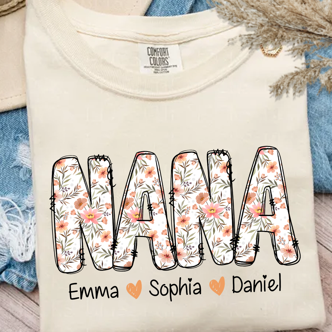 Comfort Colors_C2_AE Nana Flower 2025 Shirt Custom Grandma And Grandkids Shirt_Ivory_S 1 N8aZm