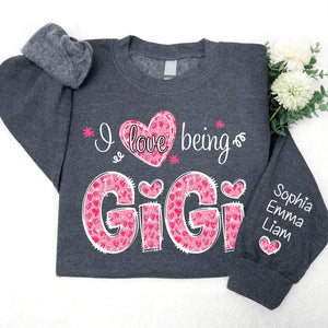 I Love Being Gigi Pink Leopard Heart  - Personalized Sweatshirt With Design On Sleeve - Gift For Grandma, Mom, Wife | Custom Sleeve NH96