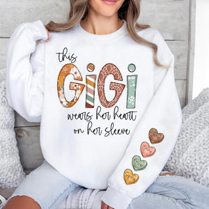 This Gigi Wears Her Heart On Her Sleeve - Personalized Sweatshirt With Design On Sleeve -  Meaningful Gifts For Grandma, Mom, Wife | Custom Sleeve NH96