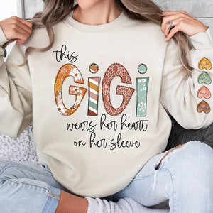 This Gigi Wears Her Heart On Her Sleeve - Personalized Sweatshirt With Design On Sleeve -  Meaningful Gifts For Grandma, Mom, Wife | Custom Sleeve NH96