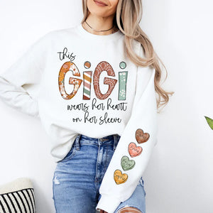 This Gigi Wears Her Heart On Her Sleeve - Personalized Sweatshirt With Design On Sleeve -  Meaningful Gifts For Grandma, Mom, Wife | Custom Sleeve NH96