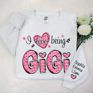 I Love Being Gigi Pink Leopard Heart  - Personalized Sweatshirt With Design On Sleeve - Gift For Grandma, Mom, Wife | Custom Sleeve NH96