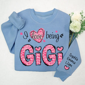 I Love Being Gigi Pink Leopard Heart  - Personalized Sweatshirt With Design On Sleeve - Gift For Grandma, Mom, Wife | Custom Sleeve NH96