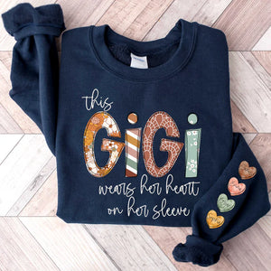 This Gigi Wears Her Heart On Her Sleeve - Personalized Sweatshirt With Design On Sleeve -  Meaningful Gifts For Grandma, Mom, Wife | Custom Sleeve NH96