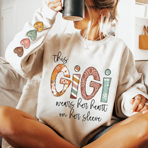 This Gigi Wears Her Heart On Her Sleeve - Personalized Sweatshirt With Design On Sleeve -  Meaningful Gifts For Grandma, Mom, Wife | Custom Sleeve NH96