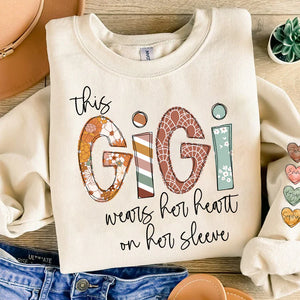 This Gigi Wears Her Heart On Her Sleeve - Personalized Sweatshirt With Design On Sleeve -  Meaningful Gifts For Grandma, Mom, Wife | Custom Sleeve NH96