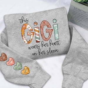 This Gigi Wears Her Heart On Her Sleeve - Personalized Sweatshirt With Design On Sleeve -  Meaningful Gifts For Grandma, Mom, Wife | Custom Sleeve NH96