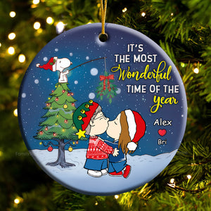 It's The Most Wonderful Time Of The Year Peanuts Under The Mistletoe - Personalized Ceramic Ornament - Gift For Couple, Husband Wife, Anniversary, Engagement, Wedding, Marriage Gift - CL45 NH96