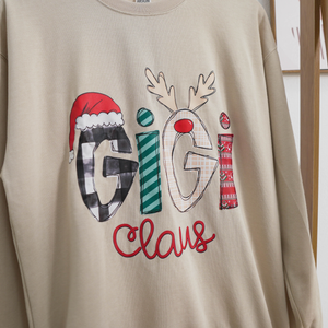 Custom Family Name Gigi Claus - Personalized Sweatshirt - Best Christmas Gift For Grandma, Mom, Family Member - NH96